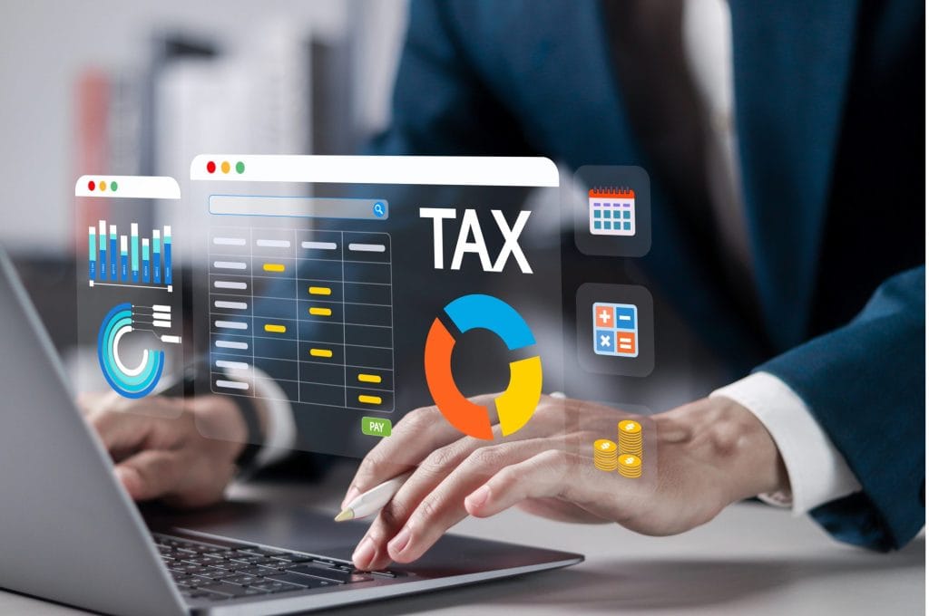Tax calculations on digital interface with financial icons, accountant analyzing tax data with charts and graphs.