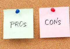 Pros of hiring professional accountants for small business financial management on a corkboard.